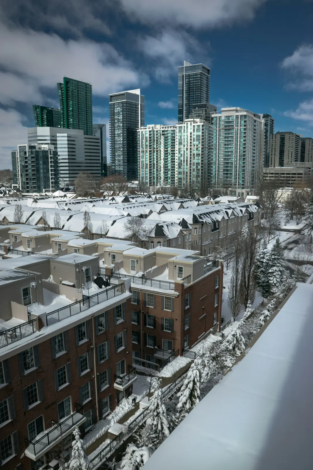 Snowy rooftops and towers in Toronto